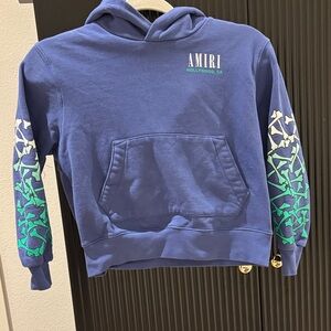 AMIRI Blue Hoodie with Green and White Sleeve Design